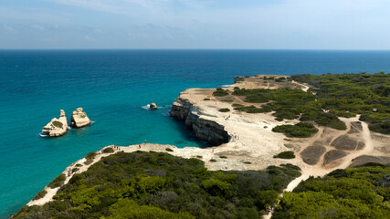 Aerial view of a cliff close to the sea. Salento coast overlooking the Adriatic Sea near Torre dell’Orso in the province of Lecce, Puglia, Italy.