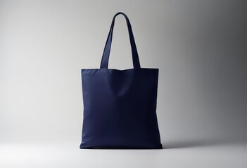 blue shopping bag,a plain blue tote bag. The bag features a minimalist design with no visible logos or patterns.isolated simple design bag