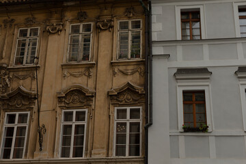 A vivid visual contrast between aged and modern building facades emphasizes and highlights architectural diversity