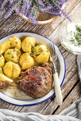 Roasted duck leg.