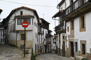 Naklejka premium traditional houses with wooden balconies in Candelario, Ávila, Castilla y León, Spain