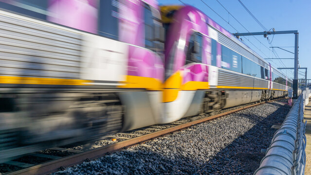 Moving commuter train in outer Melbourne, St Albans