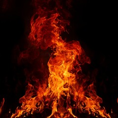 Obraz premium red flames on black background texture of fire bonfire for burning garbage cooking worm s eye view