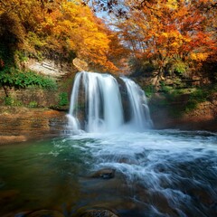 waterfall in autumn with trees