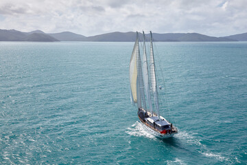 Aerial view of large sailing yacht.