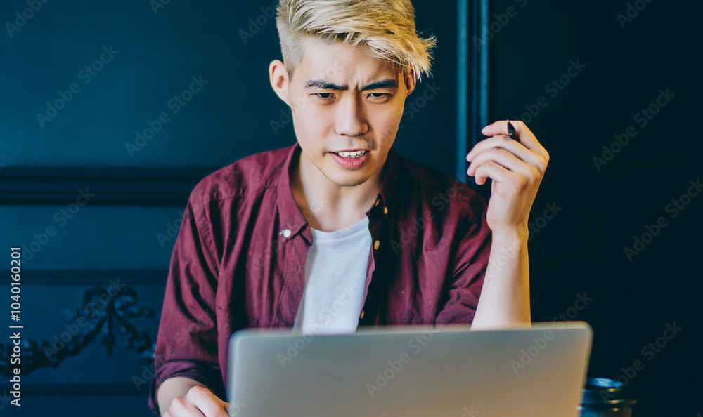 Poster wondered chinese young man working on freelance and has problem with software on modern laptop devic