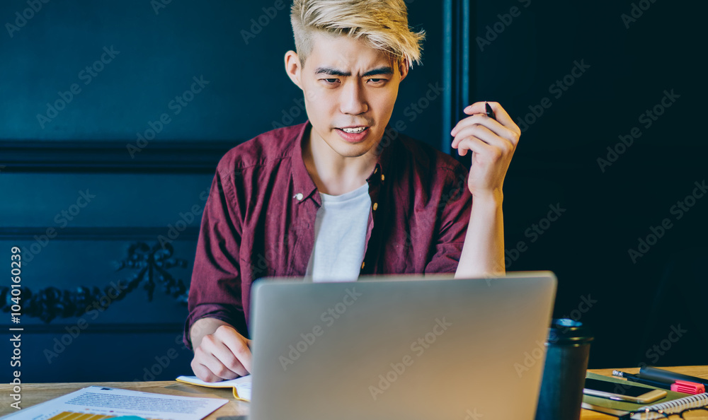 Poster wondered chinese young man working on freelance and has problem with software on modern laptop devic