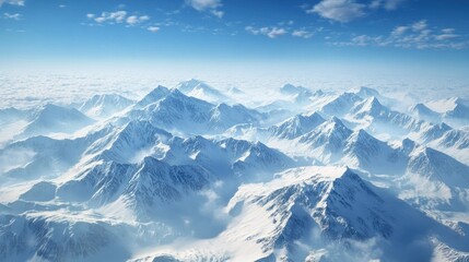Obraz premium Snow-covered peaks in the North American Rockies with wide skies, leaving room for copy