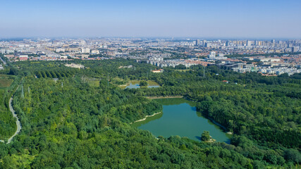 Aerial photo of China's Qingzhou City Park, surrounded by green forest