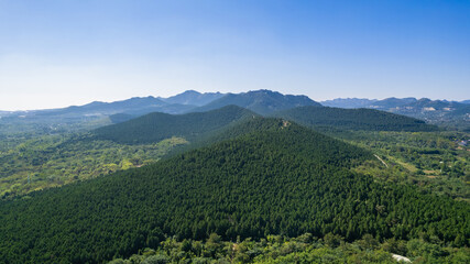 Aerial photos of the green mountains in the distance