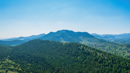Aerial photos of the green mountains in the distance