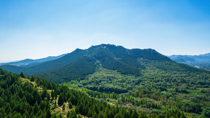 Aerial photos of the green mountains in the distance