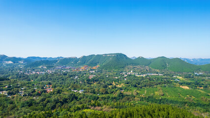 Aerial photos of the green mountains in the distance