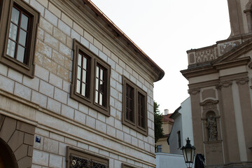 Obraz premium Capture the unique and stunning architectural features found within a captivating historical city setting