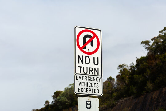 no u turn sign emergency vehicles excepted beside highway