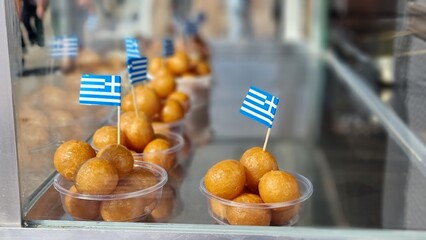 sweet loukouma or loukoumades greek flag street food sweet