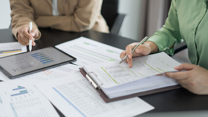 Alternative energy environment businesspeople read data to analysis about project of power future