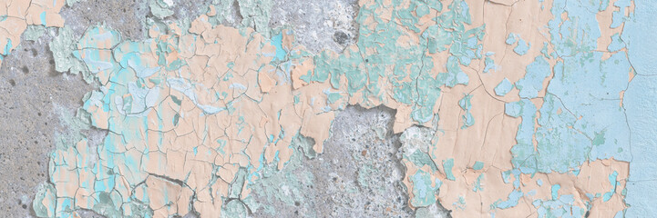 Peeling paint on the wall. Old concrete wall with cracked flaking paint. Weathered rough painted surface with patterns of cracks and peeling. Grunge texture for background and design. High resolution.