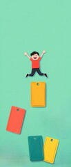 Fototapeta premium Happy child jumping on colorful blocks, playful isolated background.