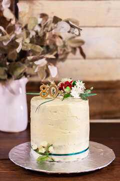 80th birthday cake with hand made australian native flowers