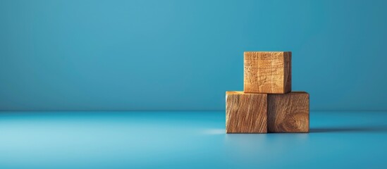 Wooden blocks bearing a message on personal growth set against a blue backdrop serving as a symbolic image with available copy space