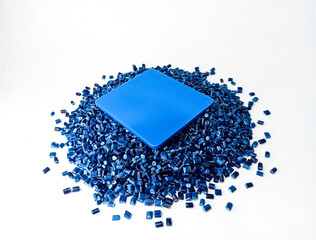 plastic masterbatch granules, blue polymer pigment pellets, blue resin, isolated on white...