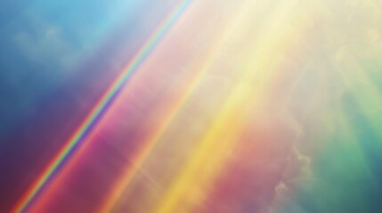 Sunlit mist creates intricate rainbow beam artwork.