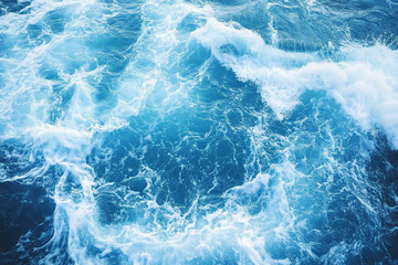 Fototapeta premium blue ocean water background with white foam waves