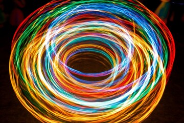 A mesmerizing display of colorful lights creates a swirling vortex of energy.