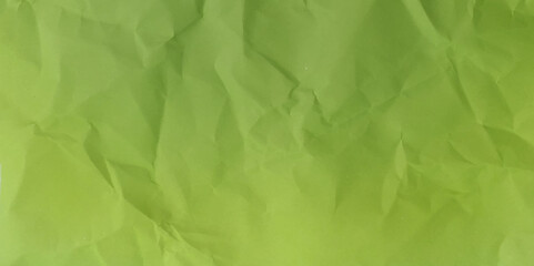 Rough crumpled texture surface of retro old vintage classic grunge paper. Background or backdrop. Design blank. Pure or mostly pure green
