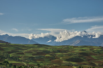 Fototapeta premium Endless beauty in the farmlands near Moray and Maras, where ancient techniques meet breathtaking landscapes. The heart of Peru’s agricultural history still thrives here.