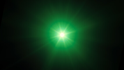 Naklejka premium Light effect of green glowing light. Solar flare. Glow effect. Starbursts