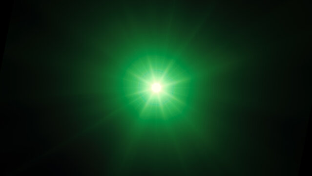 Light effect of green glowing light. Solar flare. Glow effect. Starbursts