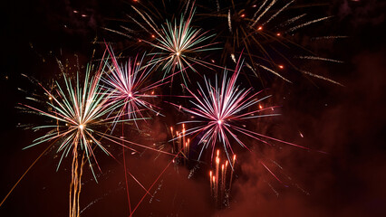 HAPPY NEW YEAR 2025 or festival - Celebration New Year's Eve, Silvester holiday background panorama greeting card - Golden firework fireworks pyrotechnics on dark night sky.