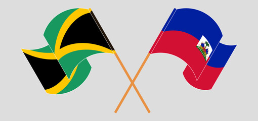 Crossed and waving flags of Jamaica and Republic of Haiti. Vector illustration
