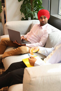Two businessmen sitting�in office