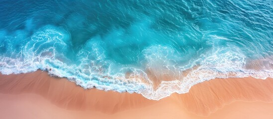 A beautiful sandy beach with turquoise waters captured from a drone s aerial perspective providing a copy space image for your text