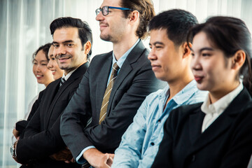 Modern diversity and multicultural company, business people joining hand together and standing in line, shared commitment to collaboration and cooperation concept background. Meticulous