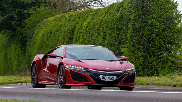 2018 red Honda NSX hybrid electric car