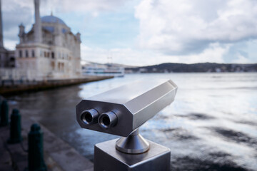 Coin Operated Binocular viewer next to the waterside promenade in Istanbul looking out to the Bay and city.