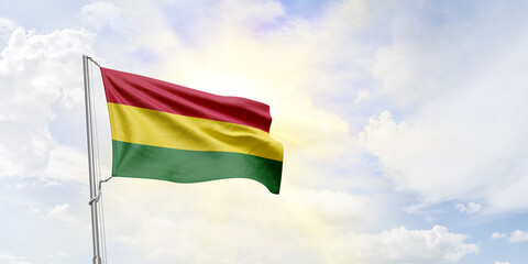 Bolivia flag waving on sky background. 3D Rendering