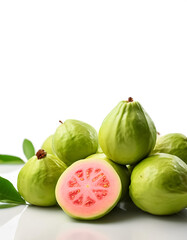 guava fruit whole and sliced scattered around background concept isolated white