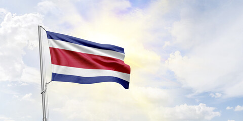 Costa Rica flag waving on sky background. 3D Rendering