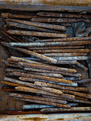macro closeup of large rusty metal stakes grunge background texture
