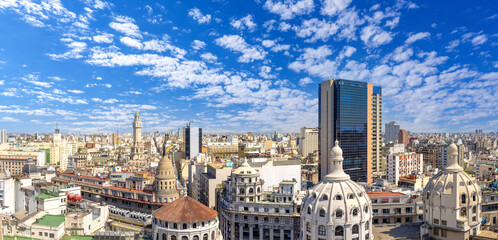 Panoramic cityscape and skyline view of Buenos Aires near landmark obelisk on 9 de Julio Avenue.