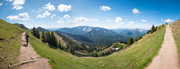mountaineer at hiking trail from Taubenstein to Rotwand mountain. idyllic bavarian landscape