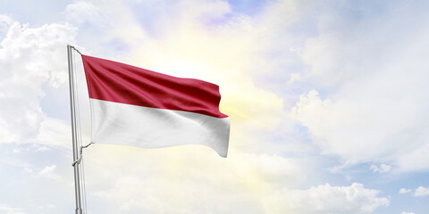 Indonesia flag waving on sky background. 3D Rendering