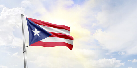 Puerto Rico flag waving on sky background. 3D Rendering