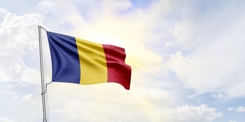 Romania flag waving on sky background. 3D Rendering