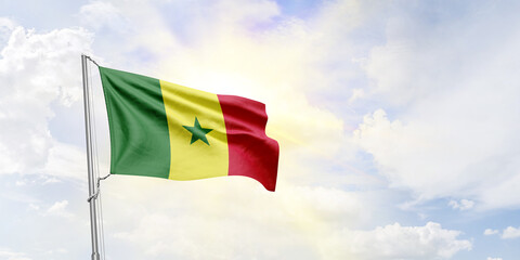 Senegal flag waving on sky background. 3D Rendering